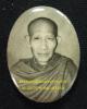 ล็อกเก็ตขาวดำ หลวงพ่อเกษม เขมโก รุ่น มงคลเกษม 81 หลังปิดแผ่นเงิน ปี 2535